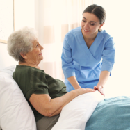 caregiver taking care of her patient