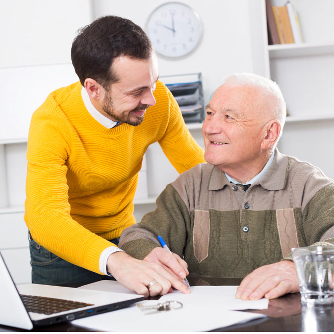 caregiver smiling to her patient