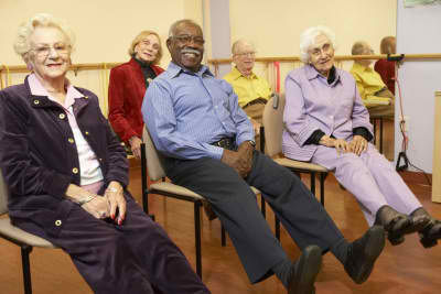 senior women and men smiling